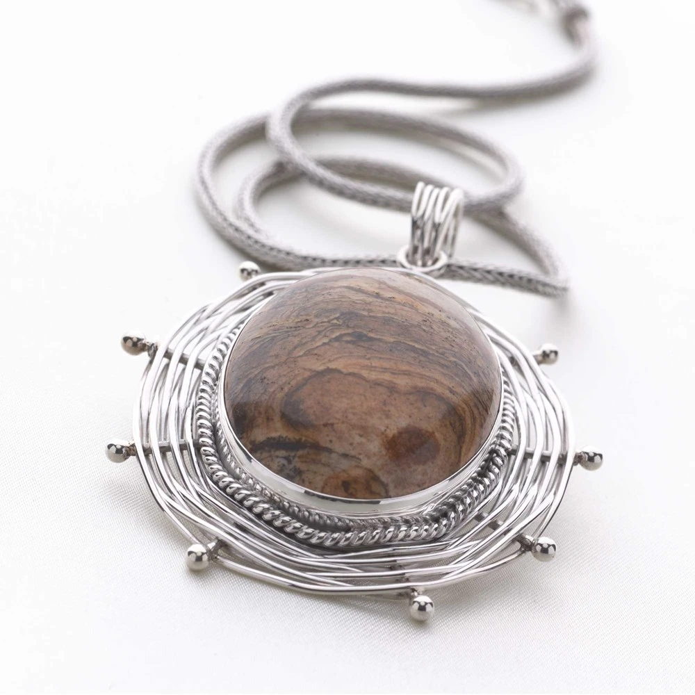 Artisan-Crafted Pendant 1 Artisan-Crafted Pendant